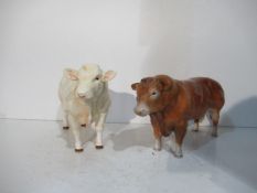 Two Beswick Cows