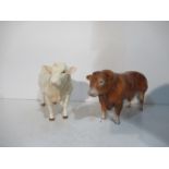 Two Beswick Cows