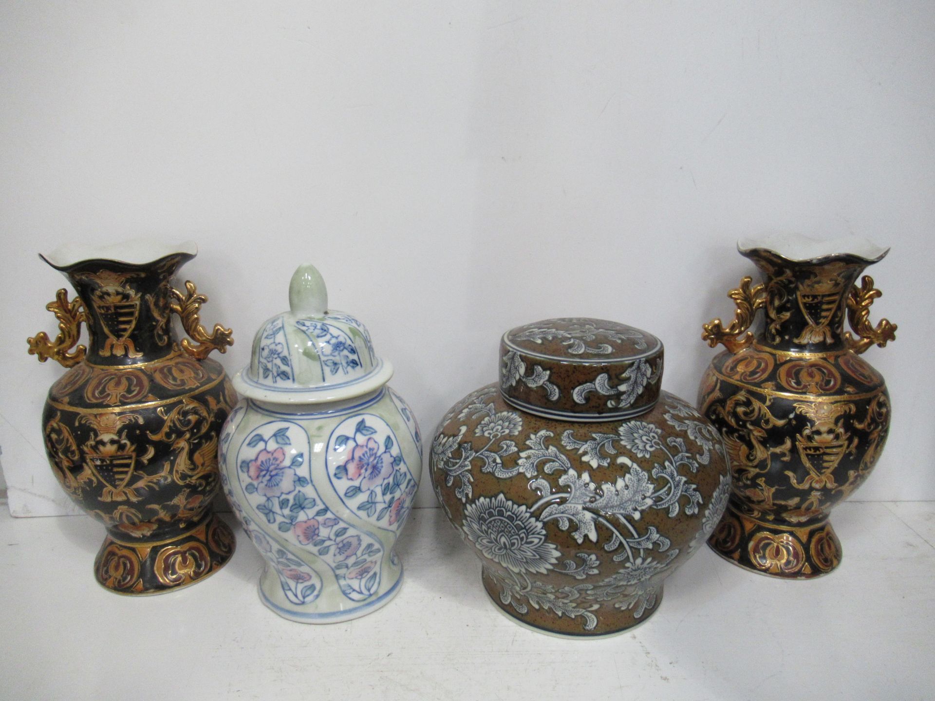 Two Chinese Black and Orange Vases together with two Urns (27cm vase/23cm urns)