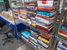 2x shelves containing books of assorted themes