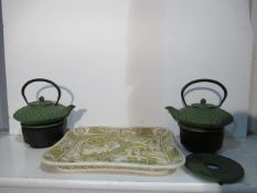 Two Cast Tea Pots with Stands and a Resin Chinese Scene on Plate/ Tray