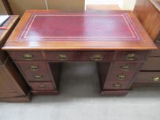 A Mahogany Nine Drawer Twin Pedestal Desk