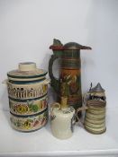 Shelf of German themed items including Tankard, Stein, bottles etc