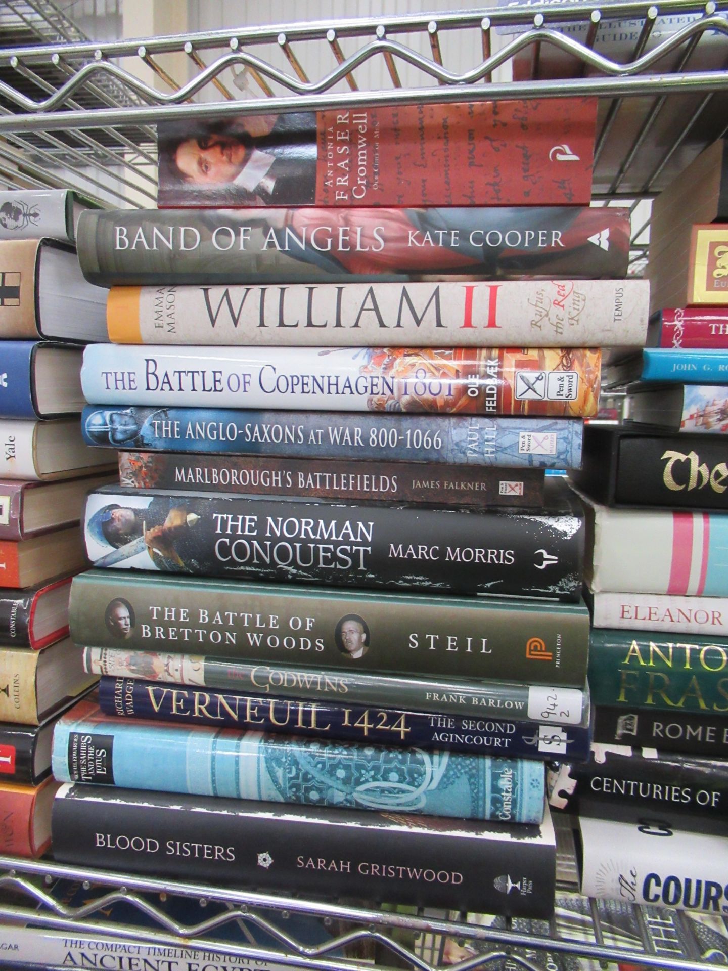 Two shelves containing an assortment of British and Global history themed books, to include 'Blood S - Image 4 of 9