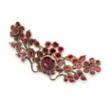 ANTIQUE GARNET DEVANT-DE-CORSAGE BROOCH, CIRCA 1800 designed as a symmetrical floral spray, set with