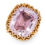 PINK TOPAZ RING mounted in 18 carat yellow gold, claw-set with a cushion-shaped pink topaz
