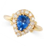 SAPPHIRE AND DIAMOND RING mounted in yellow gold, claw-set with a pear-shaped sapphire weighing 1.33