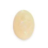 AN UNMOUNTED OPAL oval cabochon, 5.18 carats.