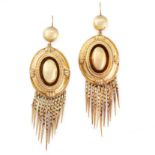 A PAIR OF ANTIQUE TASSEL EARRINGS, 19TH CENTURY in yellow gold, the oval bodies with beaded and