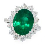 AN EMERALD AND DIAMOND DRESS RING in 18ct white gold, set with an oval cut emerald of 6.48 carats