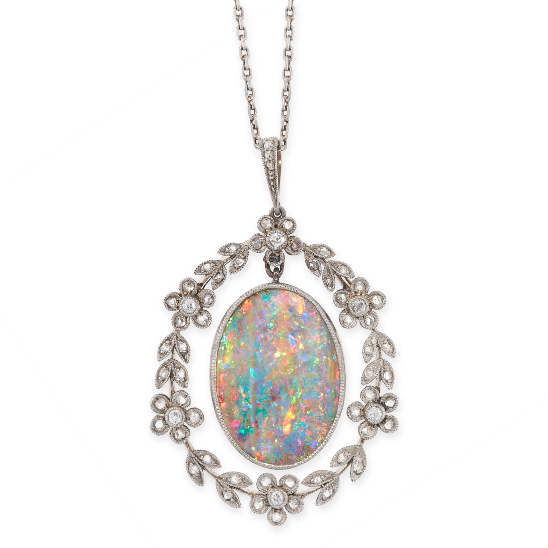 A BLACK OPAL AND DIAMOND PENDANT in yellow gold and silver, set with an oval cabochon black opal