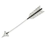 AN ART DECO DIAMOND AND SAPPHIRE ARROW BROOCH, CARTIER in platinum, designed as an arrow head, set