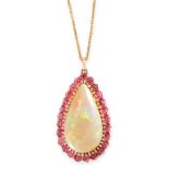 AN OPAL AND RUBY PENDANT AND CHAIN in high carat yellow gold, set with a pear shaped cabochon opal