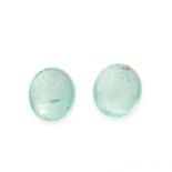 TWO UNMOUNTED EMERALDS both oval cabochon cut, totalling 7.45 carats.