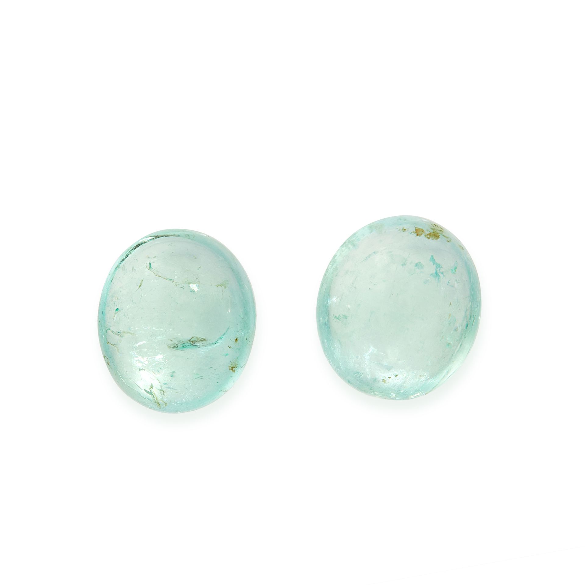 TWO UNMOUNTED EMERALDS both oval cabochon cut, totalling 7.45 carats.