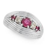 A VINTAGE RUBY AND DIAMOND DRESS RING in 18ct white gold, the tapering band of reeded design, set