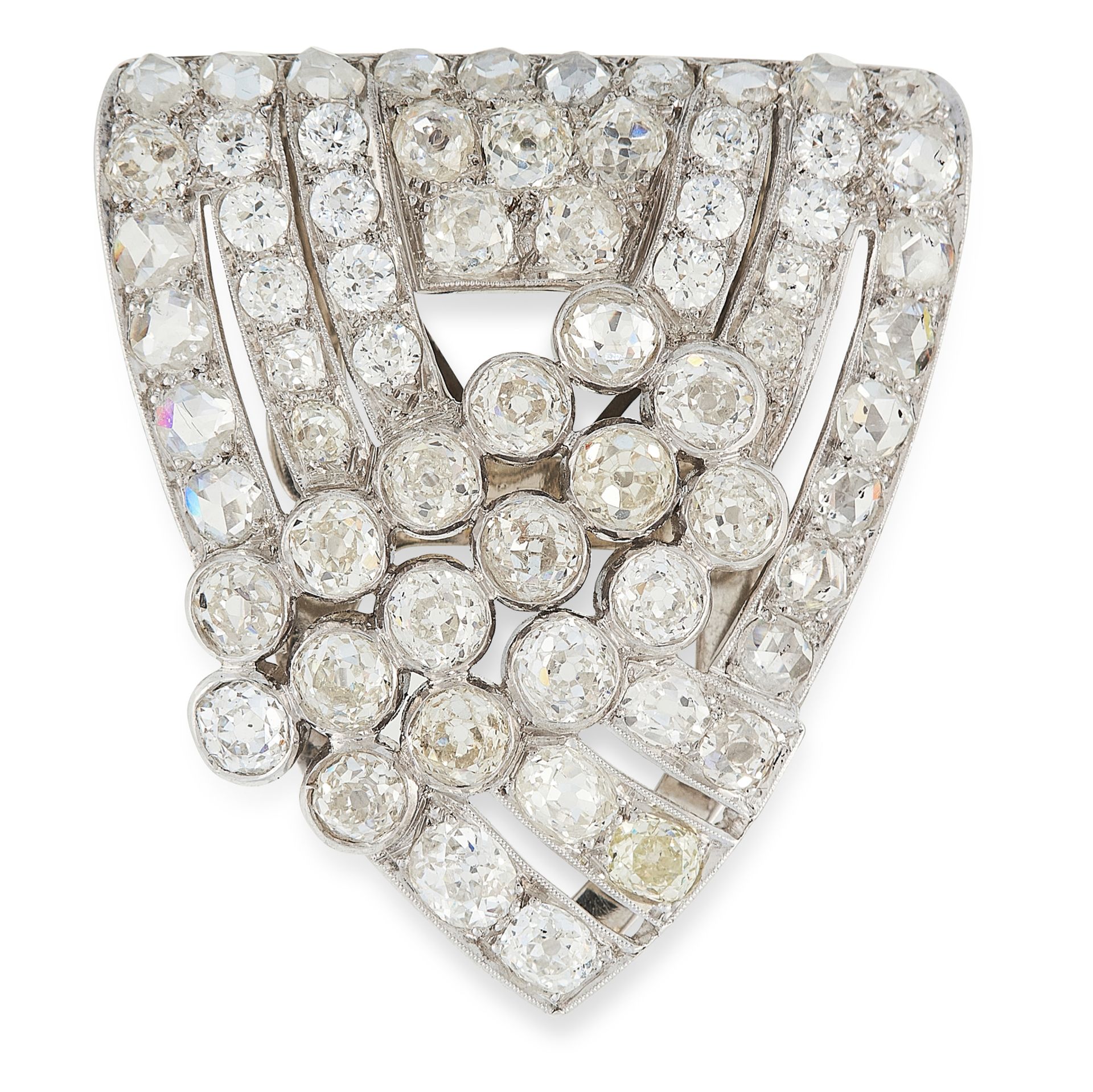 A DIAMOND CLIP BROOCH, CIRCA 1950 of shield design, set with rows of old cut and rose cut diamonds