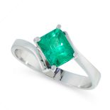 AN EMERALD RING in 18ct white gold, the twisted shank is set with an emerald cut emerald of 1.25