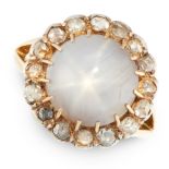 AN ANTIQUE STAR SAPPHIRE AND DIAMOND DRESS RING in 18ct yellow gold and silver, set with a round