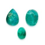 THREE UNMOUNTED EMERALDS two oval cabochon, one pear shaped cabochon, totalling 6.68 carats.