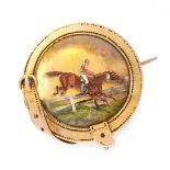 AN ANTIQUE REVERSE INTAGLIO CRYSTAL STEEPLECHASE BROOCH, 19TH CENTURY in yellow gold, set with a