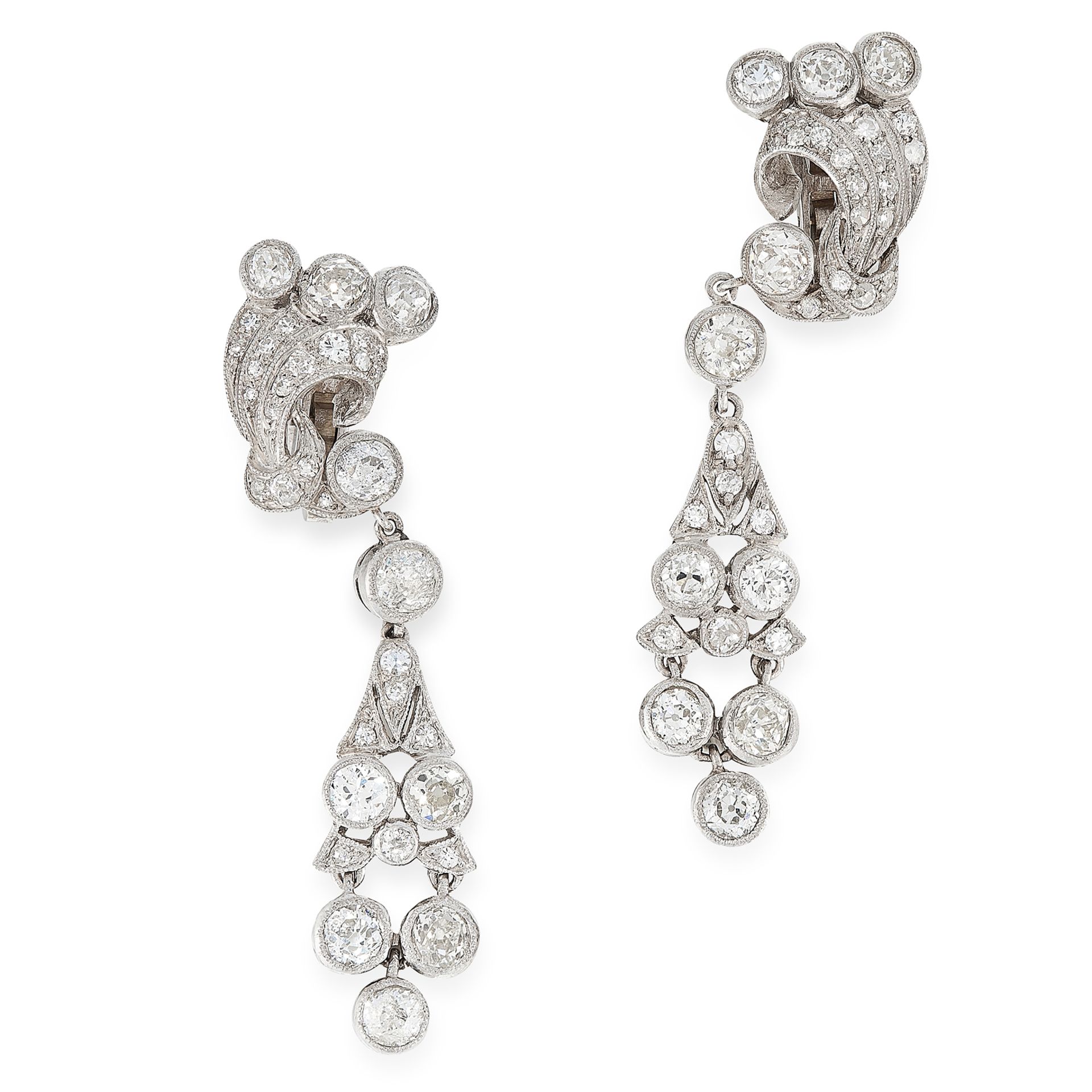 A PAIR OF DIAMOND DROP EARRINGS in platinum and white gold, each formed of a scrolling motif,