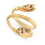 A RUBY AND JADE SNAKE RING in yellow gold, designed as a snake with two heads, coiled around on