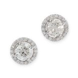A PAIR OF DIAMOND STUD EARRINGS in 18ct white gold, each set with a round cut diamond of 0.51 and