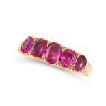 AN ANTIQUE RUBY DRESS RING, 19TH CENTURY in yellow gold, set with a row of five graduated cushion