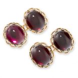 A PAIR OF ANTIQUE GARNET AND DIAMOND CUFFLINKS in 18ct yellow gold, each face set with an oval