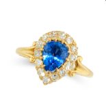 AN ANTIQUE SAPPHIRE AND DIAMOND DRESS RING in 18ct yellow gold, set with a pear cut sapphire of 1.33