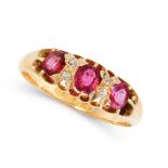 AN ANTIQUE VICTORIAN RUBY AND DIAMOND DRESS RING, 1886 in 18ct yellow gold, set with a trio of