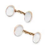 A PAIR OF MOONSTONE CUFFLINKS, EARLY 20TH CENTURY in yellow gold, each formed of two links set