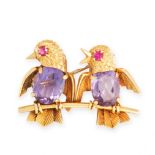 A VINTAGE AMETHYST AND RUBY BIRD BROOCH in yellow old, designed as a pair of birds seated on a