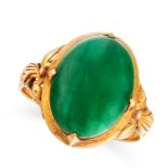 A NATURAL JADEITE JADE RING in high carat yellow gold, set with an oval cabochon jadeite, accented