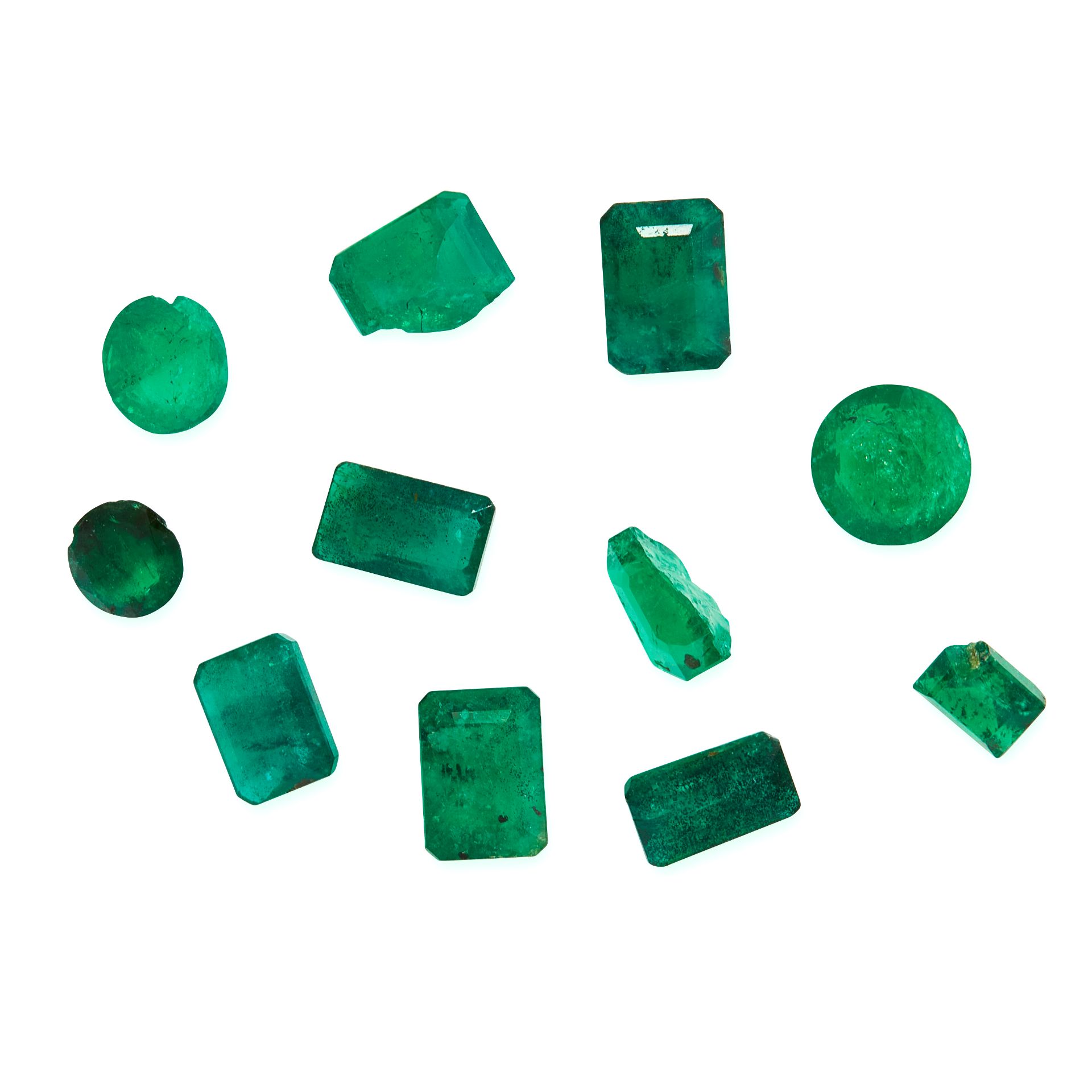 A MIXED LOT OF UNMOUNTED EMERALDS various cuts including emerald cut, round cut, all totalling 7.