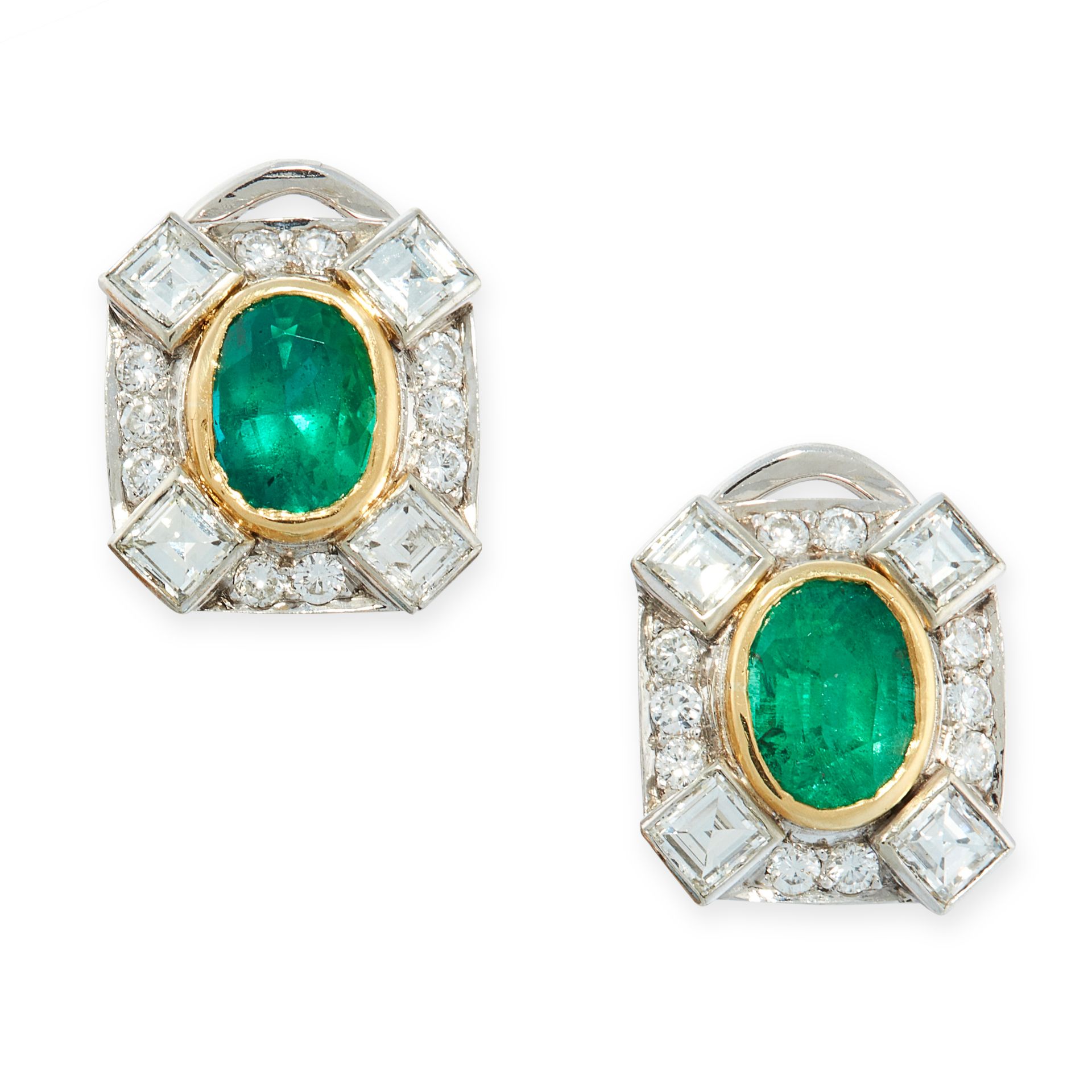 A PAIR OF EMERALD AND DIAMOND EARRINGS in white and yellow gold, each set with an oval cut