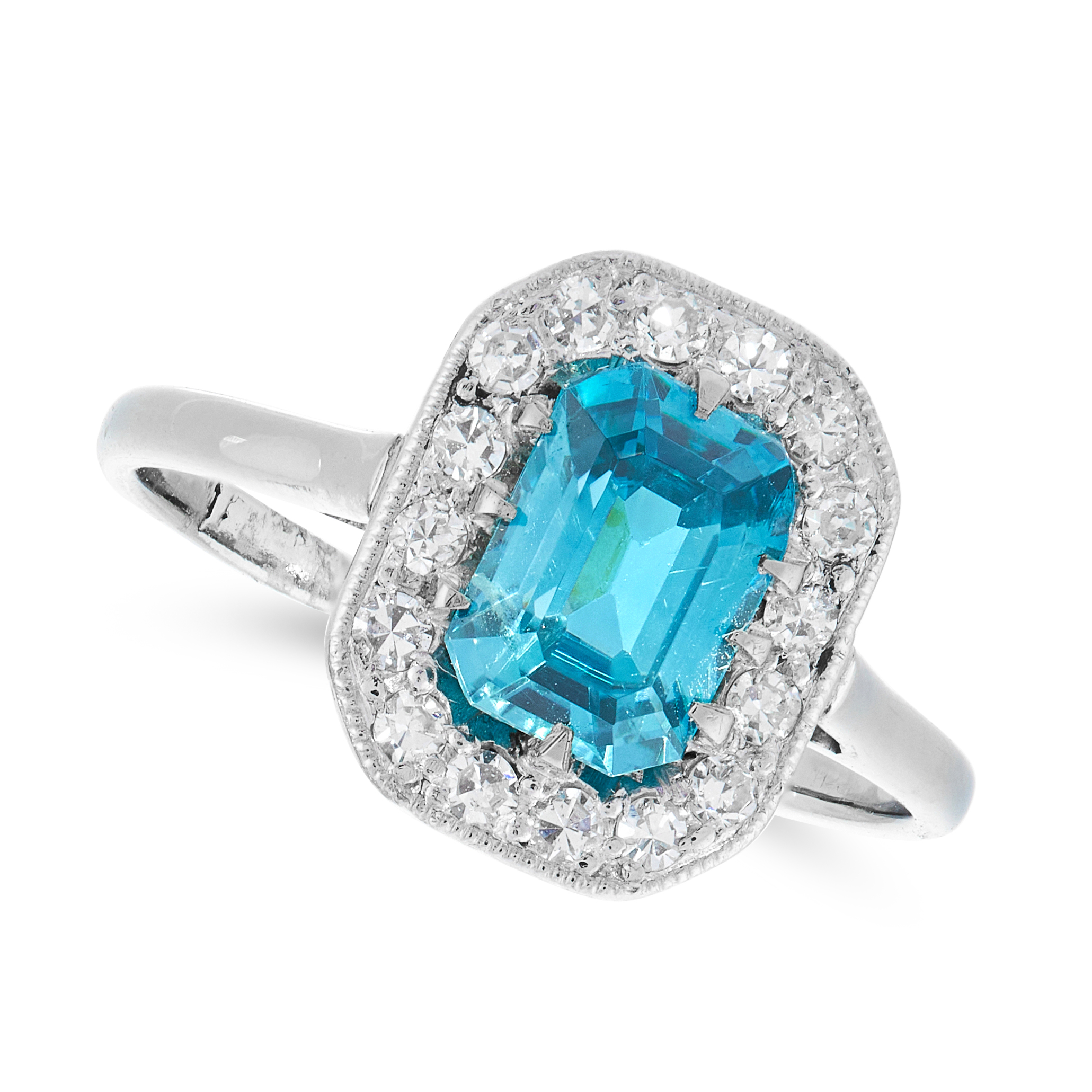 A BLUE ZIRCON AND DIAMOND DRESS RING, CIRCA 1930 set with an emerald cut blue zircon of 1.87 carats,