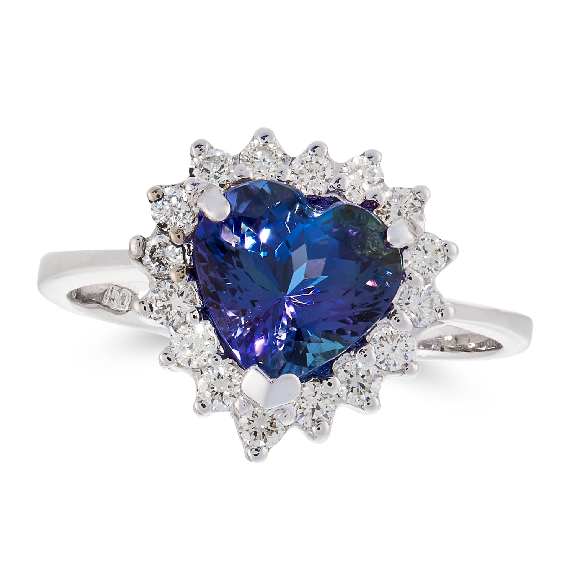 A TANZANITE AND DIAMOND DRESS RING in 18ct white gold, set with a heart shaped brilliant cut