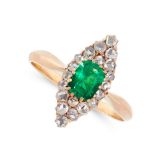 AN ANTIQUE EMERALD AND DIAMOND DRESS RING in yellow gold, the navette face set with an emerald cut