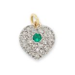 AN EMERALD AND DIAMOND HEART PENDANT / CHARM in yellow gold and silver, set with a central round cut