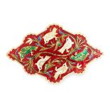 AN ANTIQUE INDIAN ENAMEL BROOCH the stylised design featuring birds among foliage relieved in white,