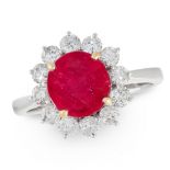 A BURMA NO HEAT RUBY AND DIAMOND CLUSTER RING in 18ct white gold, set with a round cut ruby of 3.