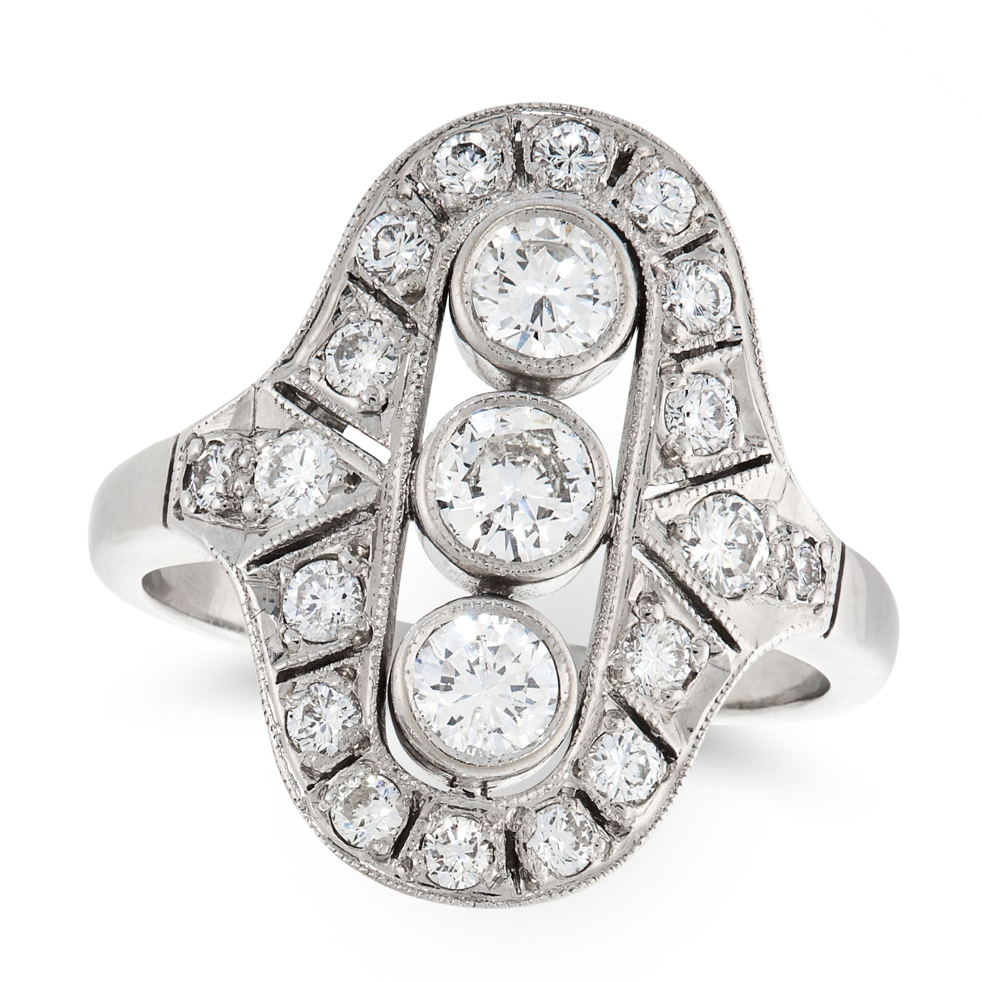 A VINTAGE DIAMOND DRESS RING the face set with a trio of principal round cut diamonds, within a