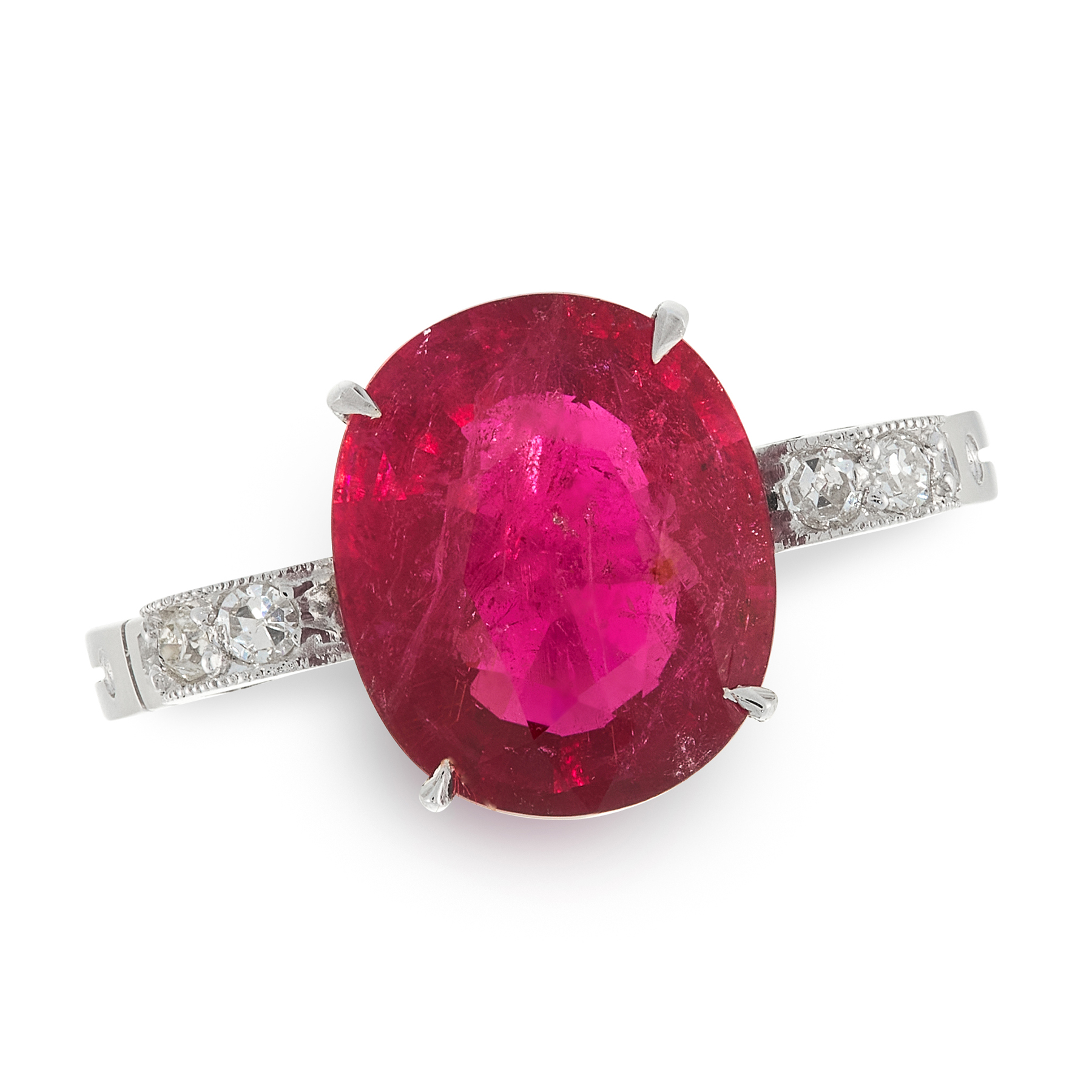 A RUBELLITE TOURMALINE AND DIAMOND DRESS RING set with an oval cut rubellite tourmaline of 3.50