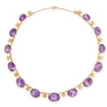 AN ANTIQUE AMETHYST RIVIERE NECKLACE, 19TH CENTURY comprising a single row of thirteen graduated