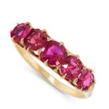AN ANTIQUE UNHEATED RUBY DRESS RING in high carat yellow gold, set with a row of five graduated