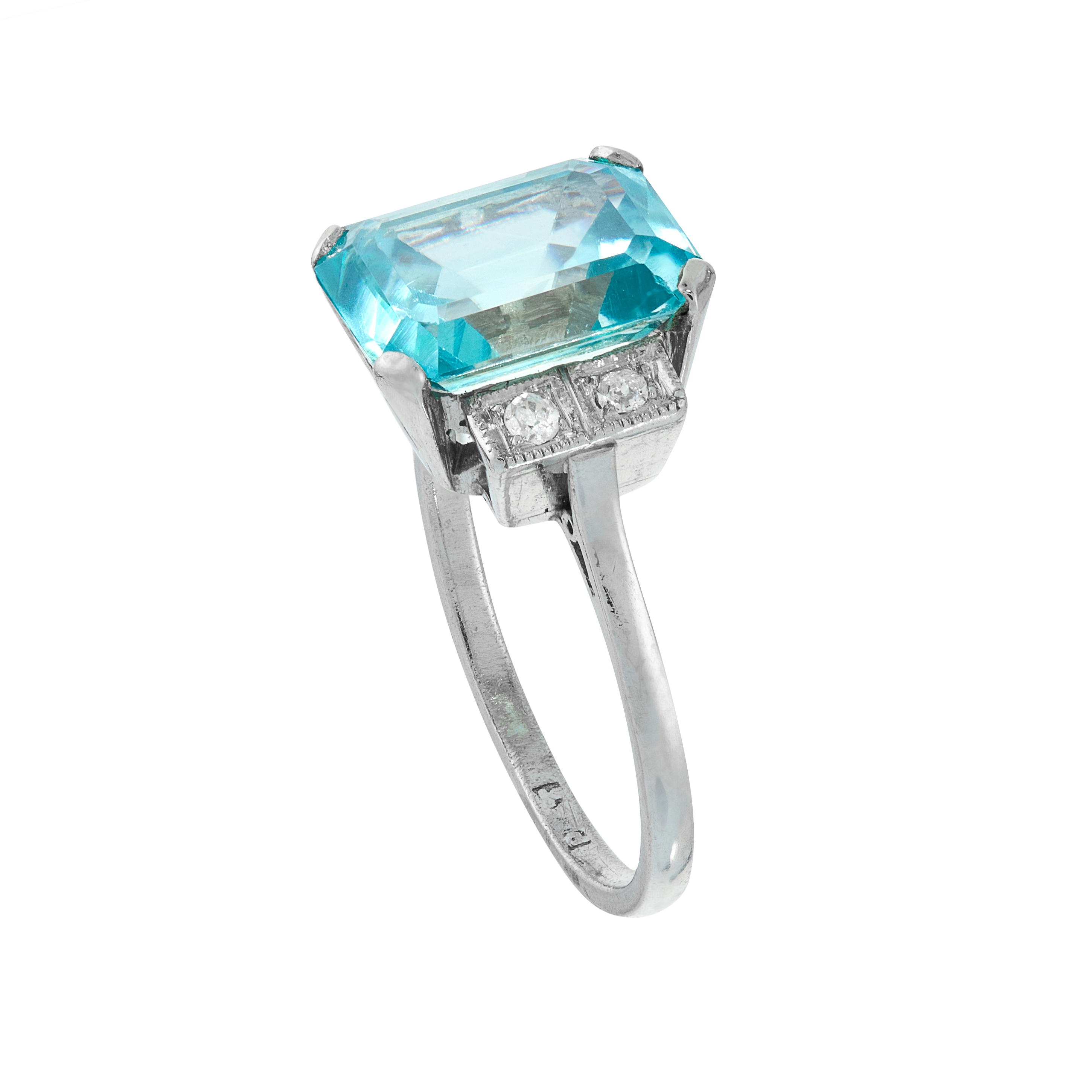 A BLUE ZIRCON AND DIAMOND DRESS RING, EARLY 20TH CENTURY in platinum, set with an emerald cut blue - Image 2 of 2