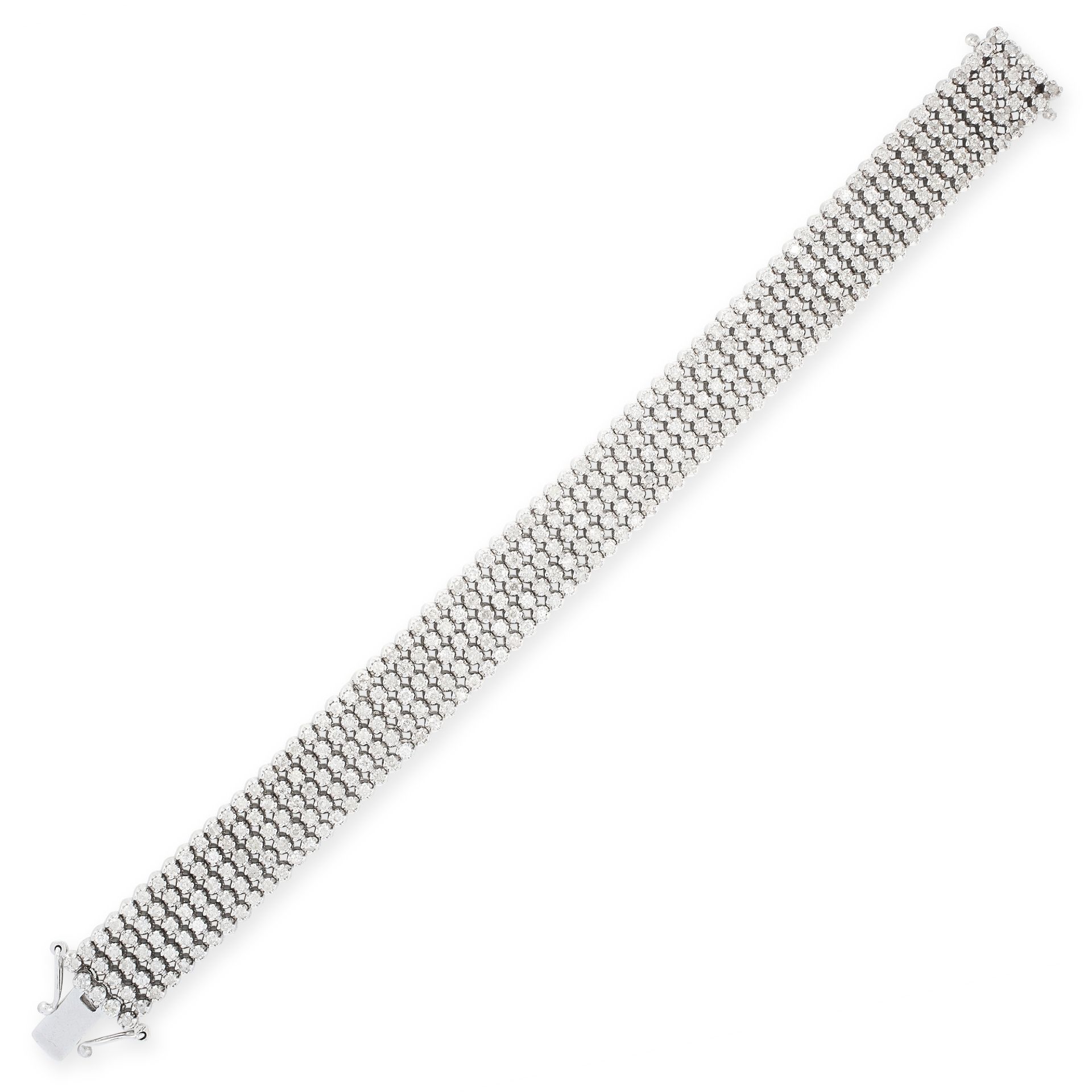 A DIAMOND BRACELET in white gold, comprising five rows of round cut diamonds, all totalling 9.5-10.5