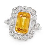 A VINTAGE YELLOW SAPPHIRE AND DIAMOND DRESS RING in 18ct white gold, set with an emerald cut